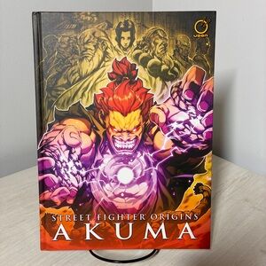 Street Fighter Origins: Akuma Graphic Art Hardcover - Red & Purple Cover